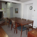 kingfisher cottage fireplace and dining area